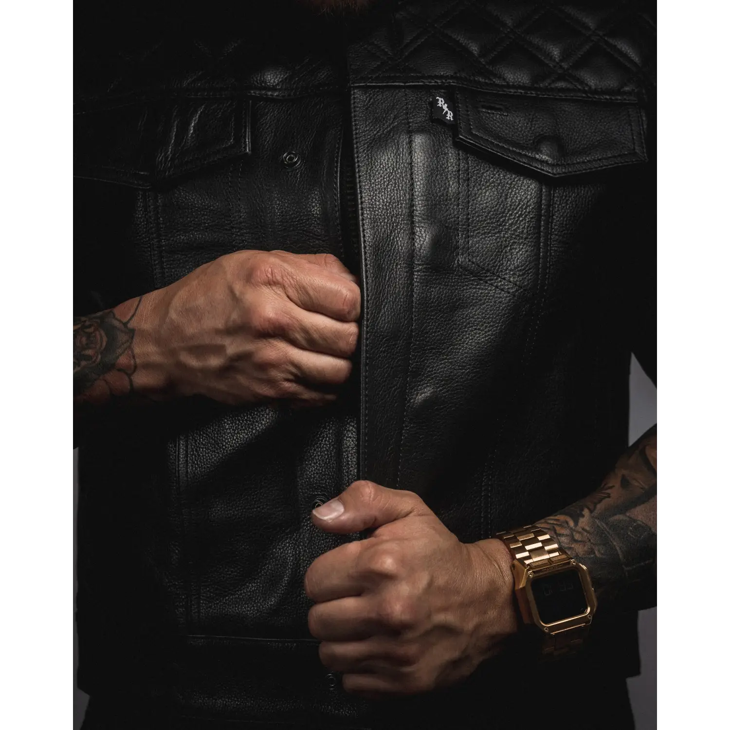 Black leather vest with YKK zippers and cowhide leather carry pockets for a stylish look